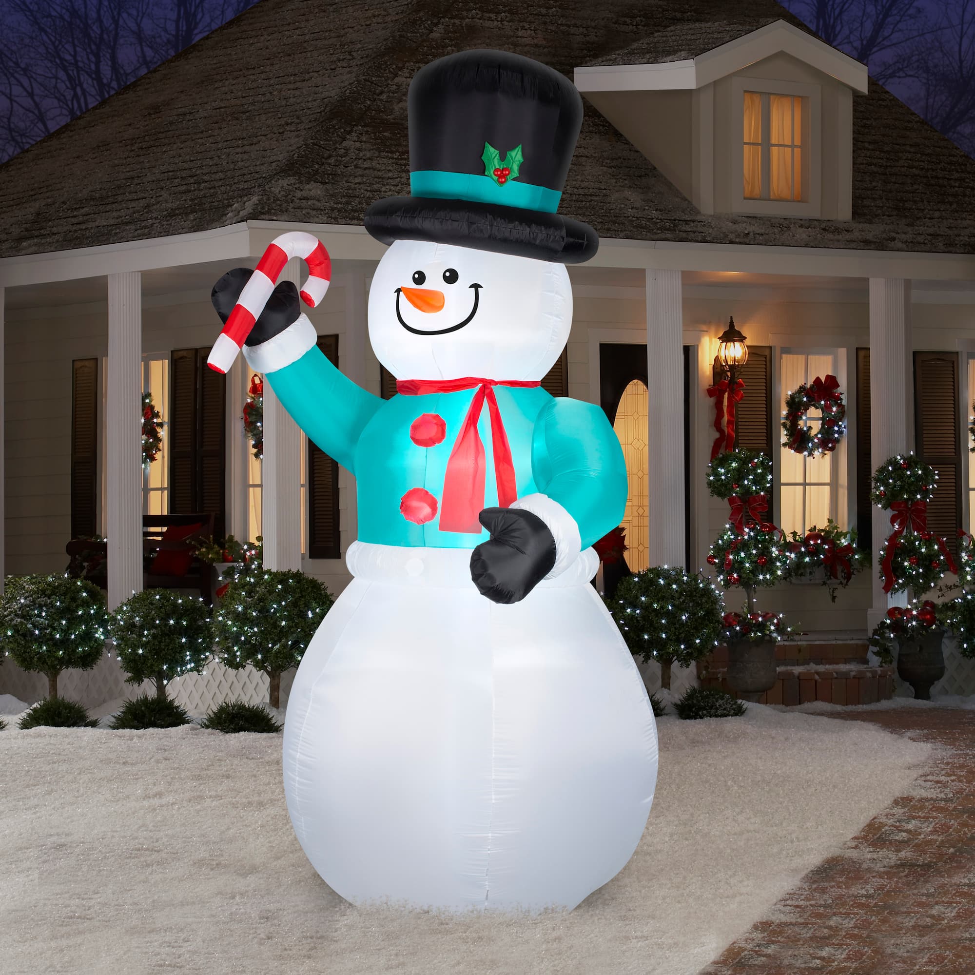 12ft. Airblown® Inflatable Snowman with Candy Cane